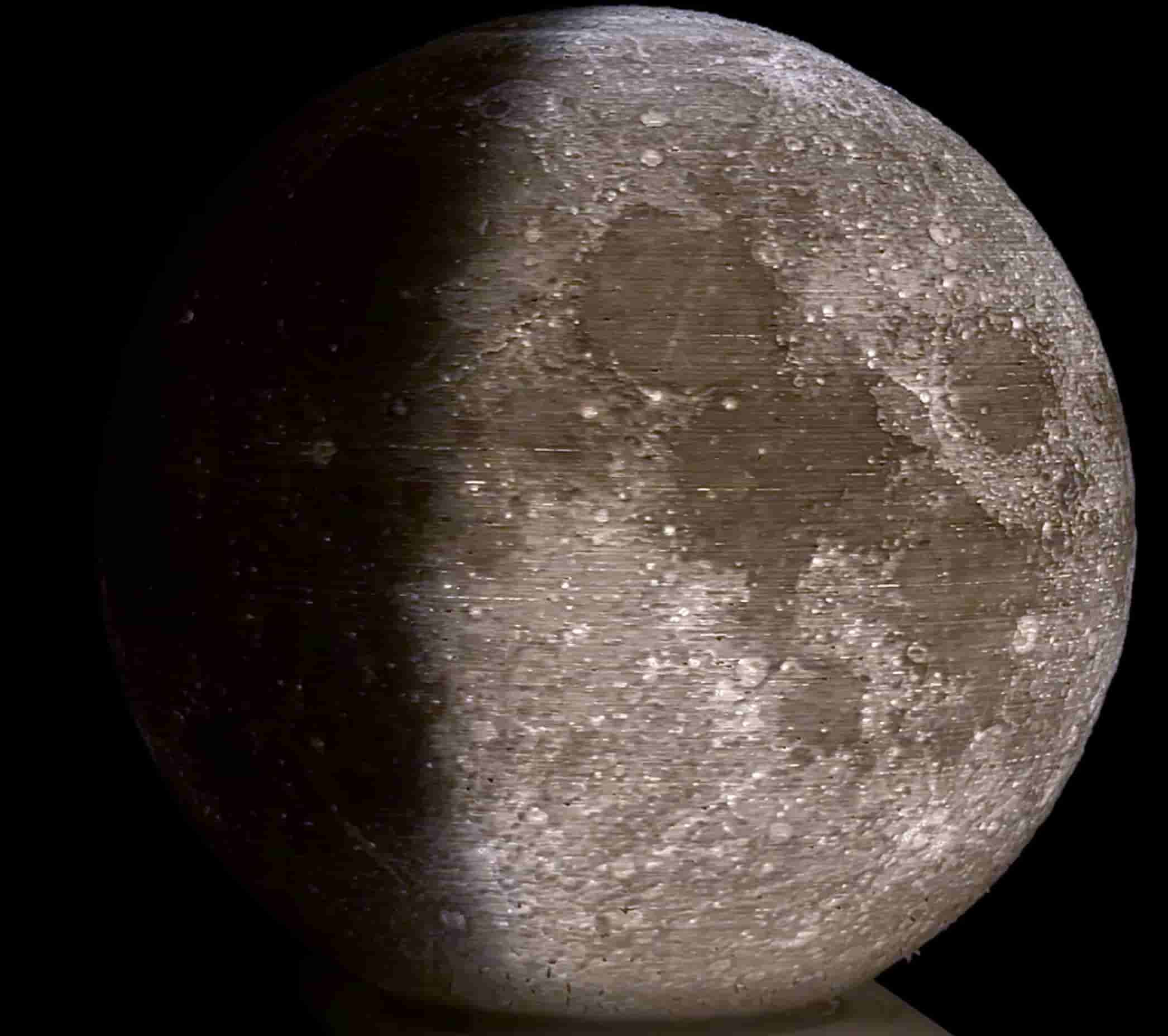 A of a lit moon lamp.