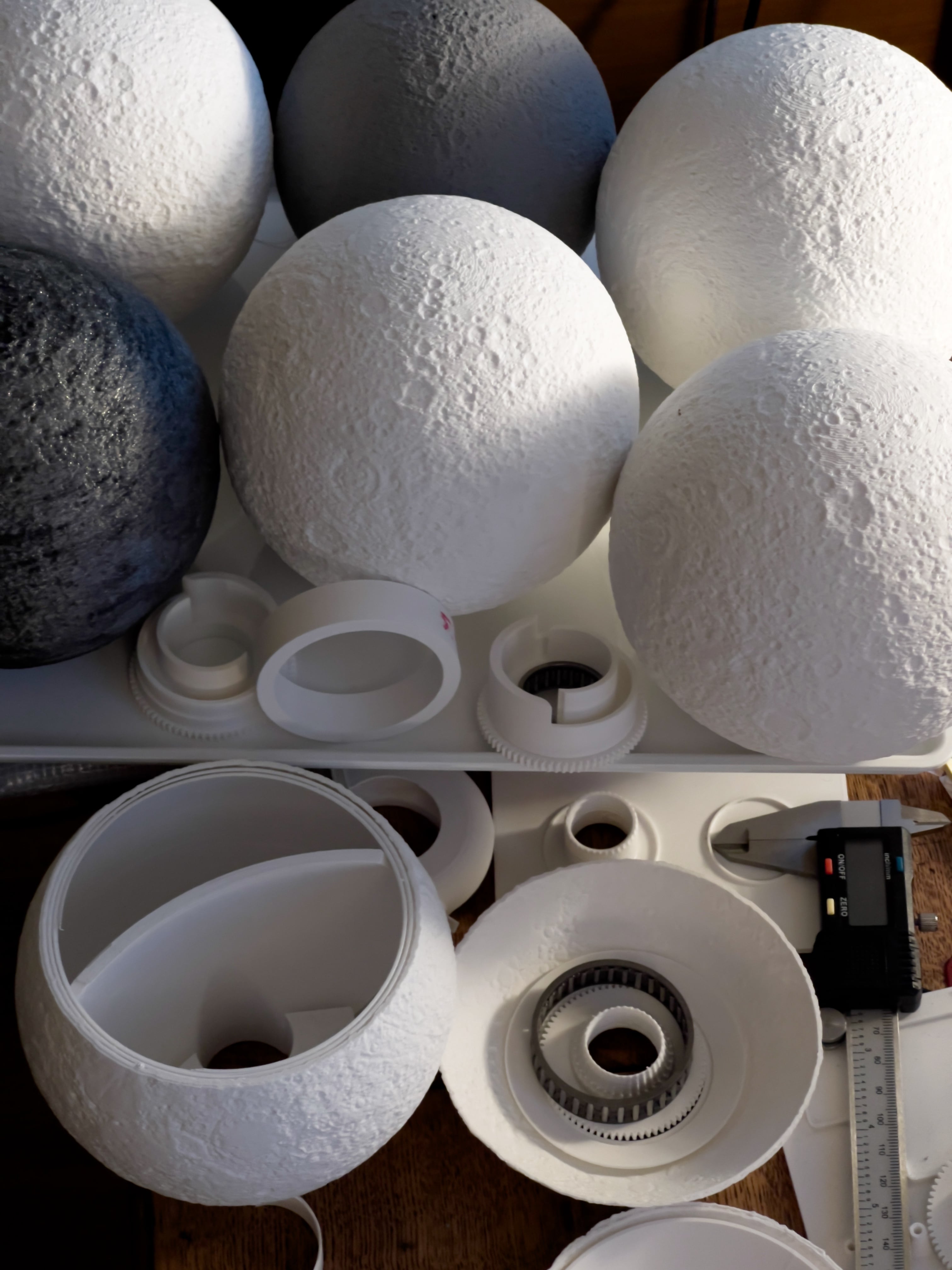 A video showcasing a moon lamp. It starts as extreme close up, and then pulls out to reveal the whole moon.